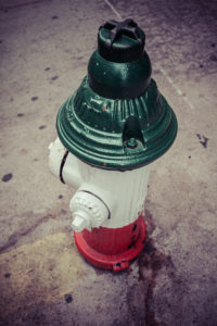 Water Hydrant in italian flag colors, Little Italy, Manhattan, New York, USA Water Hydrant in italian flag colors, Little Italy, Manhattan, New York, USA